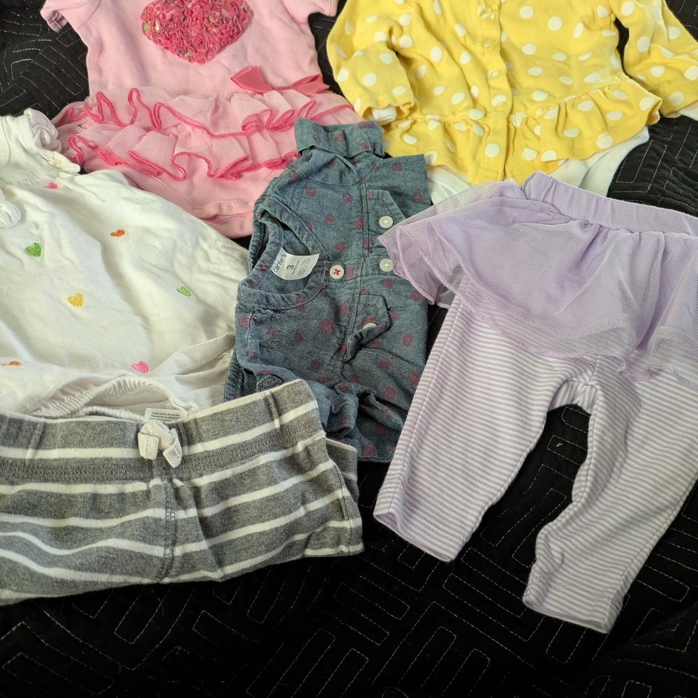 Carter's Sunny Yellow, Pink, Blue And White Baby Bodysuit with White Dots.